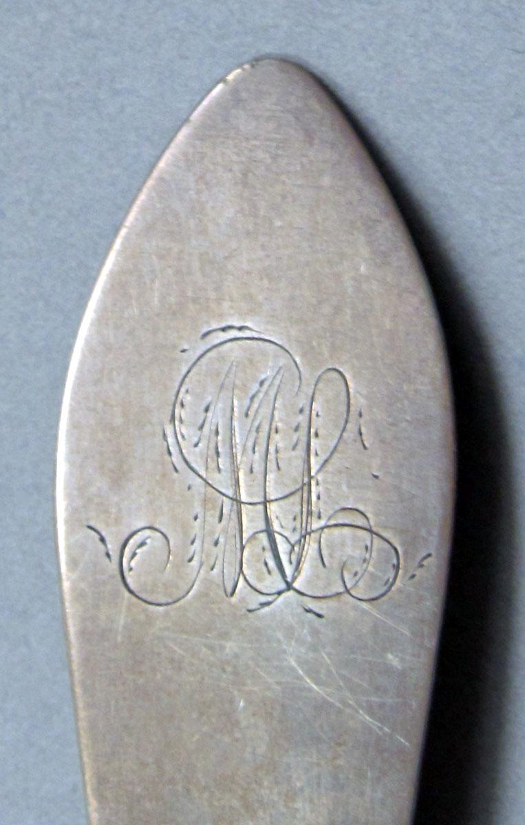 1962.0240.1252 Silver spoon engraving
