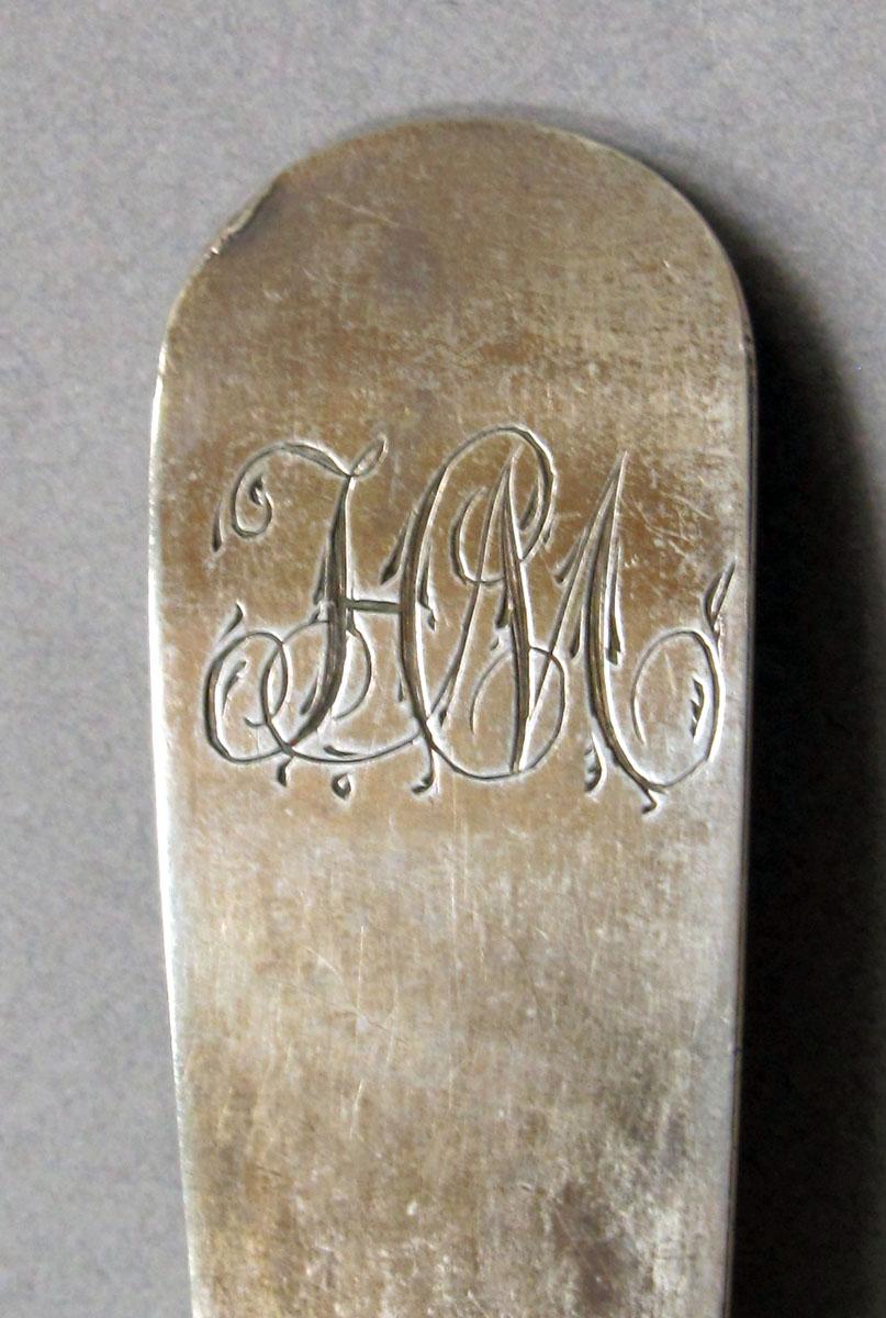 1962.0240.1255 Silver spoon engraving