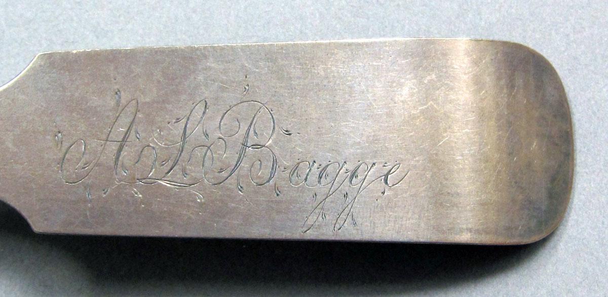 1962.0240.1257 Silver spoon engraving