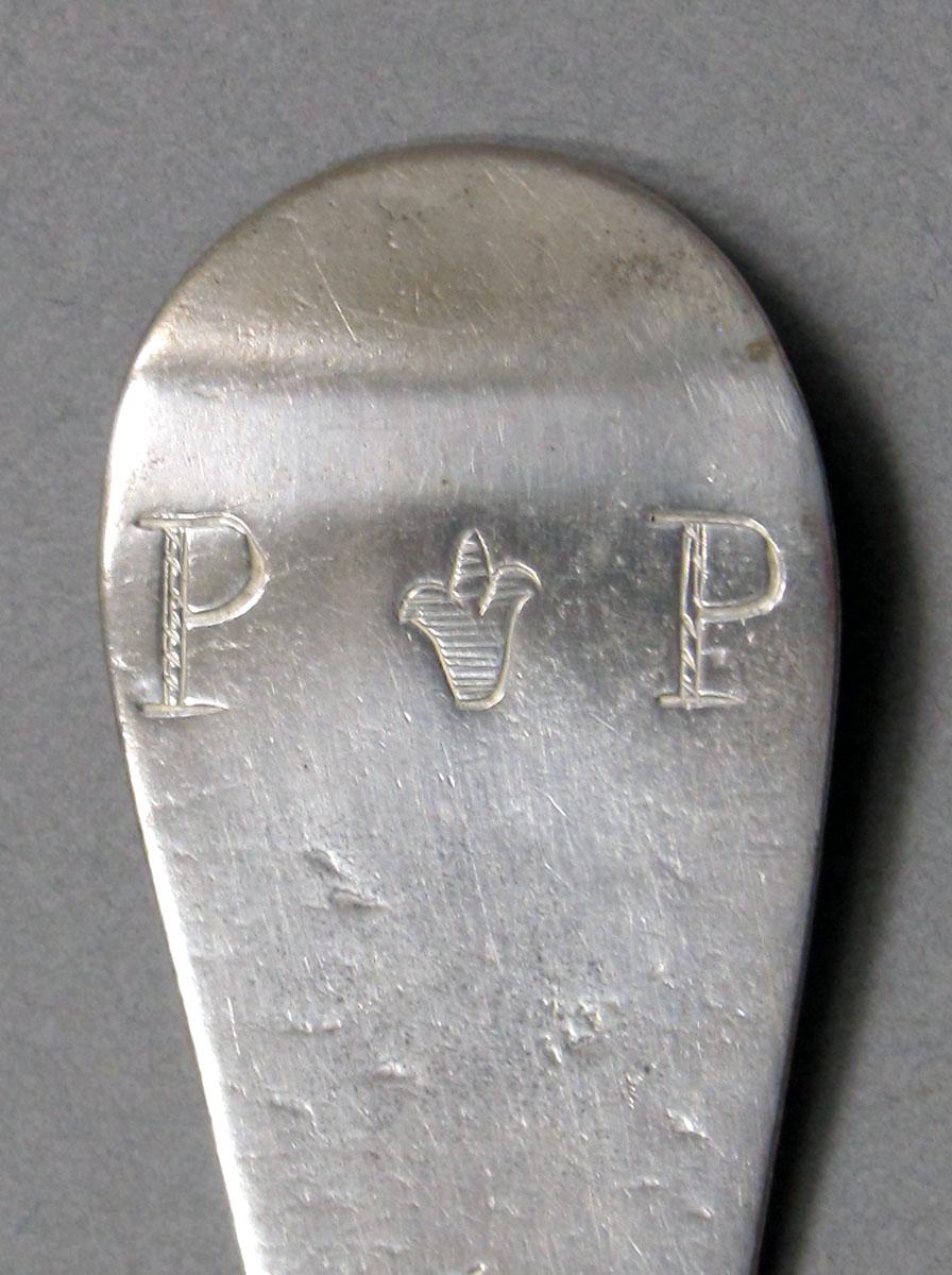 1962.0240.1258 Silver spoon engraving