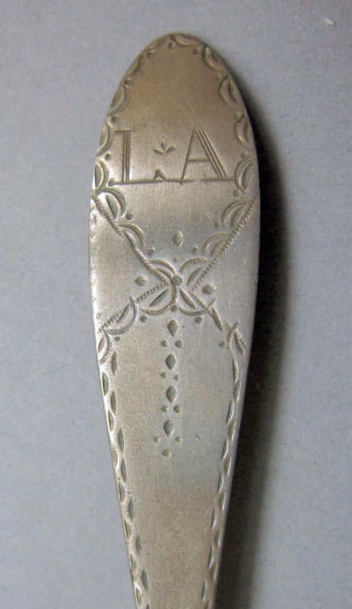 1962.0240.125 teaspoon engraving
