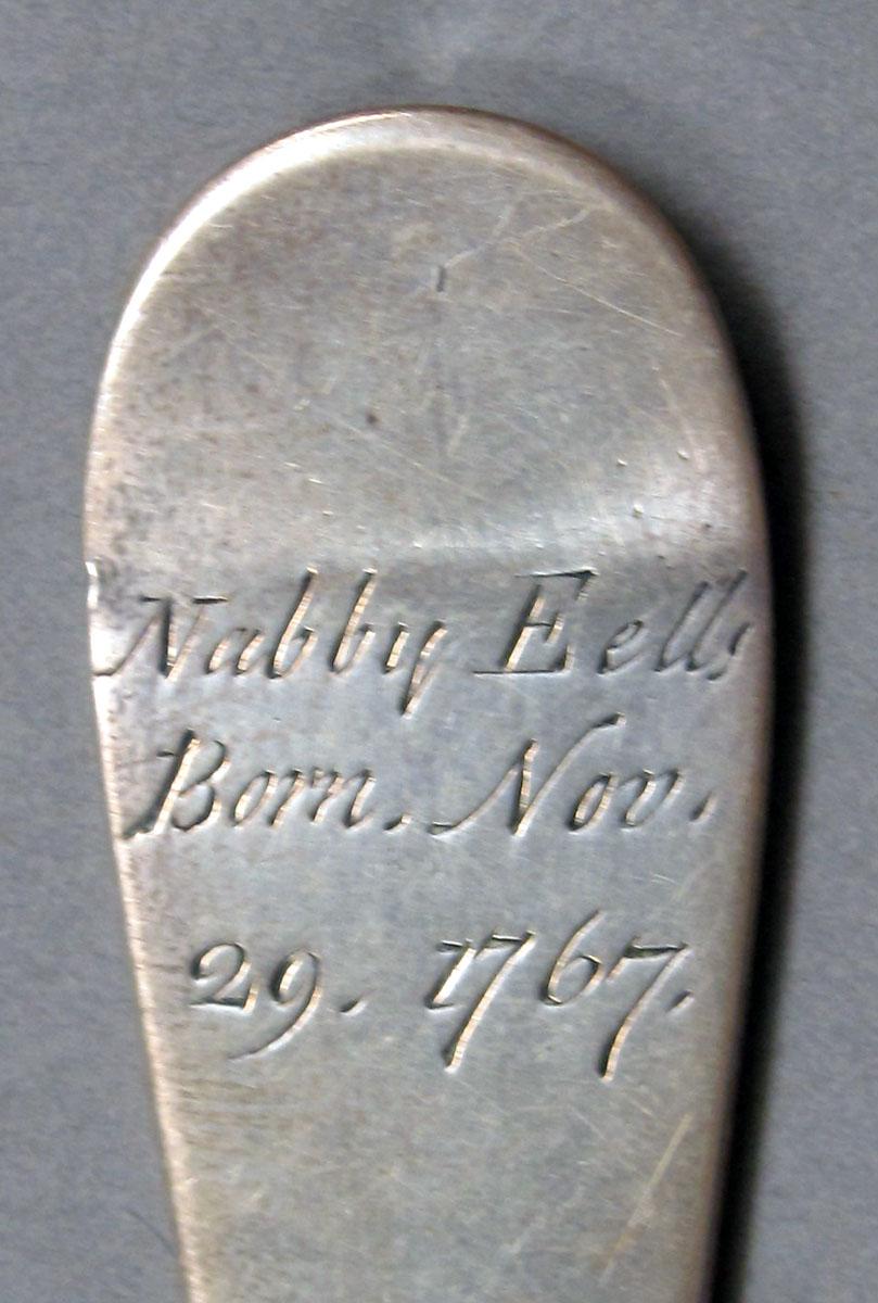 1962.0240.1263 Silver spoon engraving