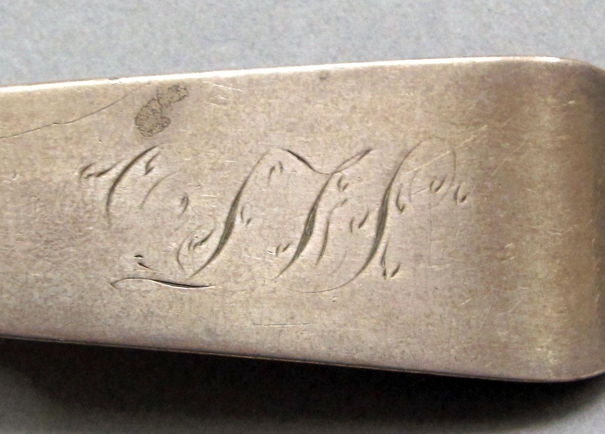 1962.0240.1267 Silver spoon engraving