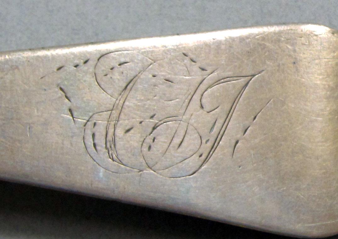 1962.0240.1269 Silver spoon engraving
