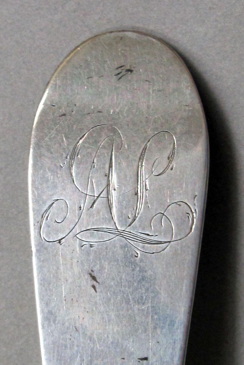 1962.0240.1271 Silver spoon engraving