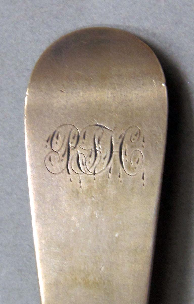 1962.0240.1273 Silver spoon engraving