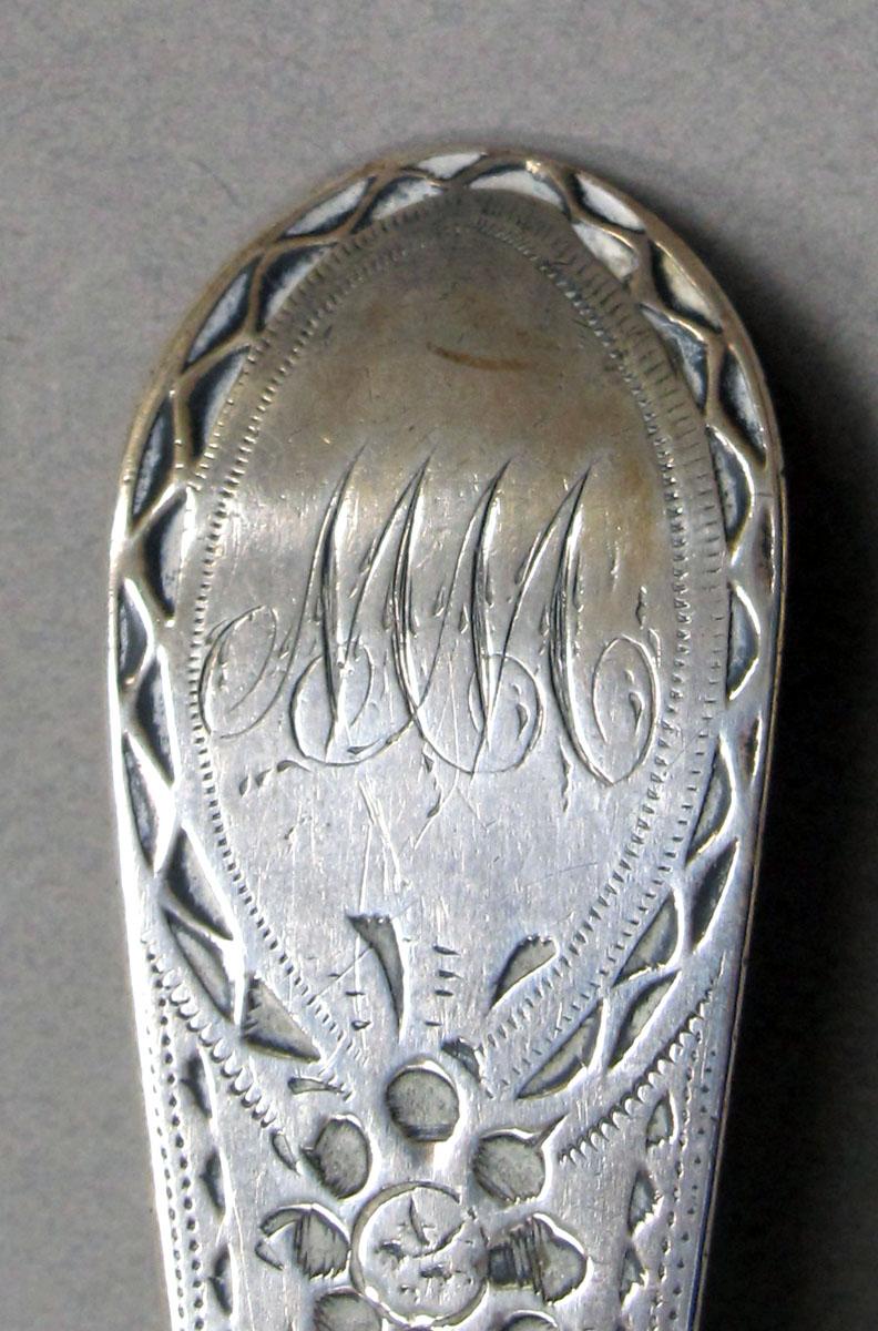 1962.0240.1275 Silver spoon engraving
