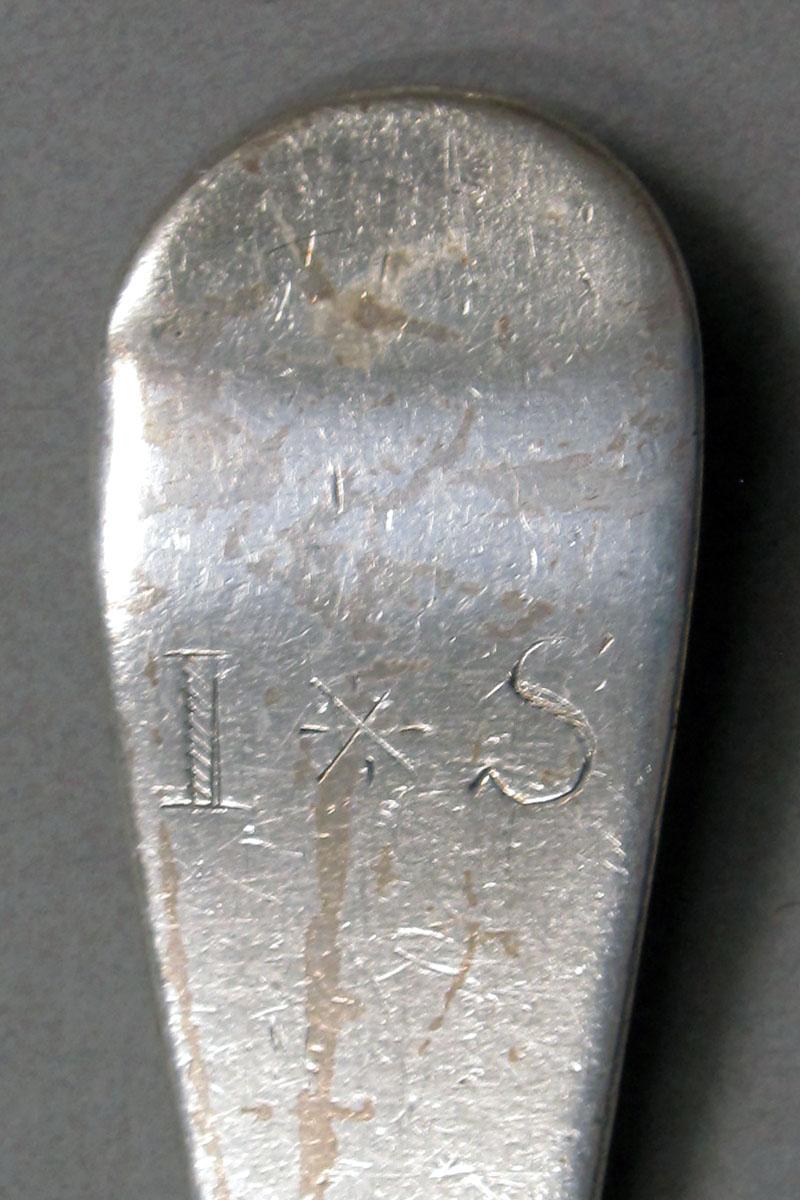 1962.0240.1276 Silver spoon engraving