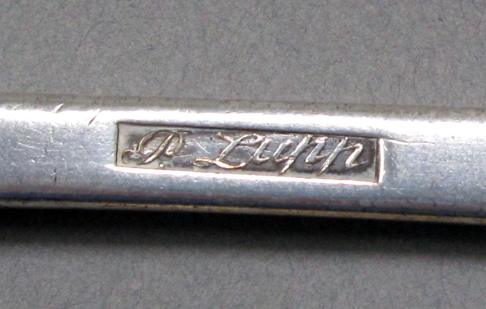 1962.0240.1276 Silver spoon mark