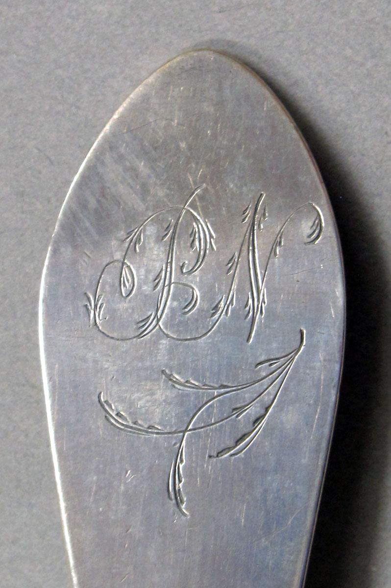 1962.0240.1280 Silver spoon engraving
