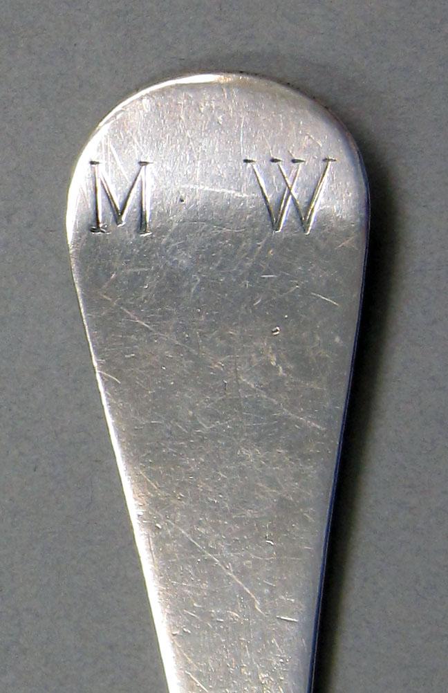 1962.0240.1282 Silver spoon engraving