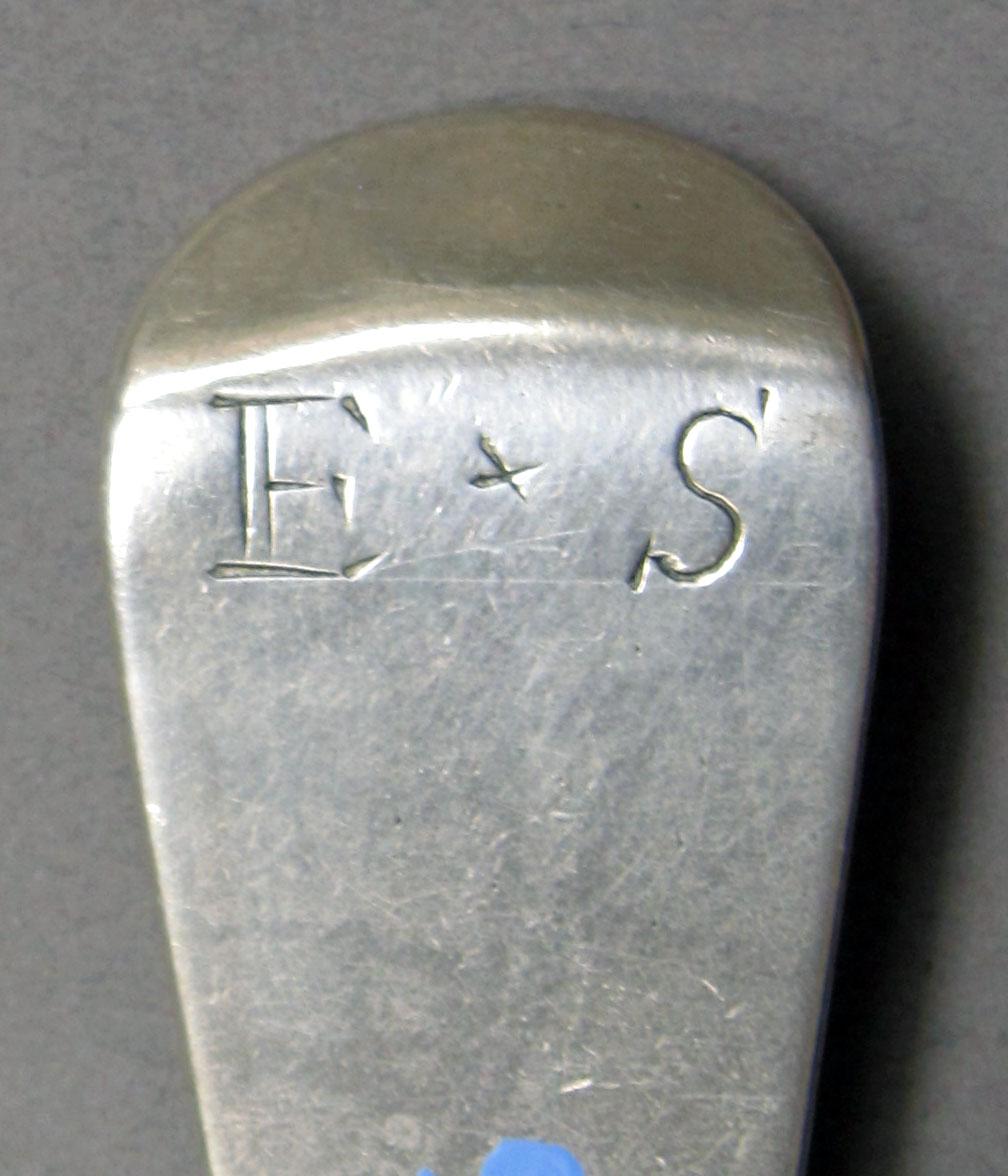 1962.0240.1288 Silver spoon engraving