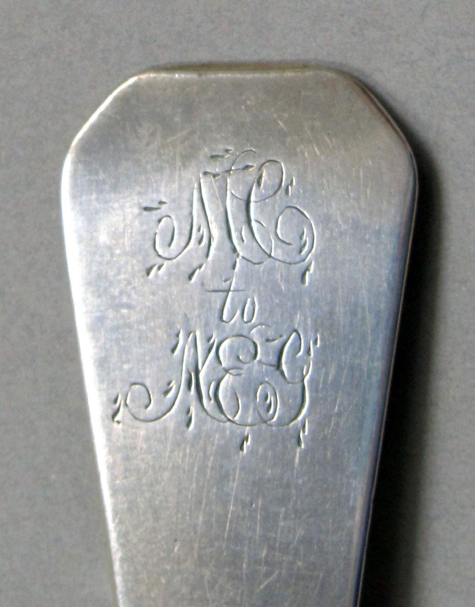 1962.0240.1289 Silver spoon engraving