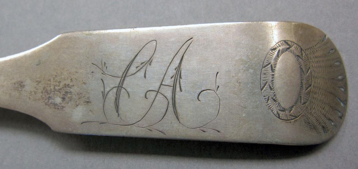 1962.0240.128 teaspoon engraving