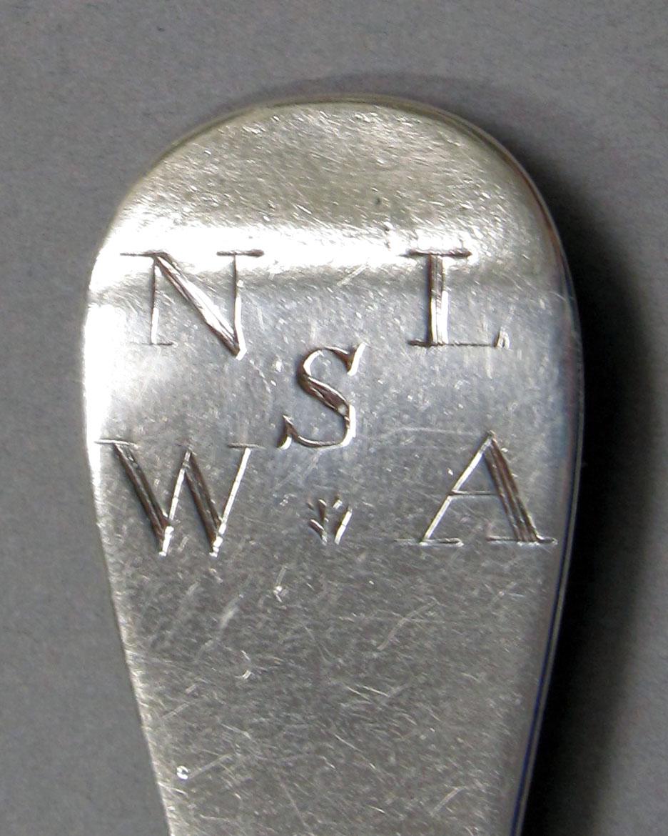 1962.0240.1295 Silver spoon engraving