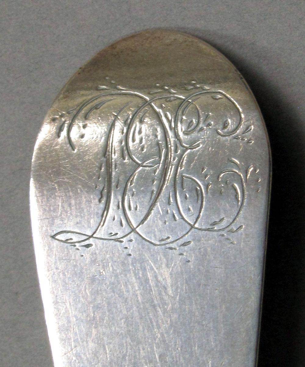 1962.0240.1296 Silver spoon engraving