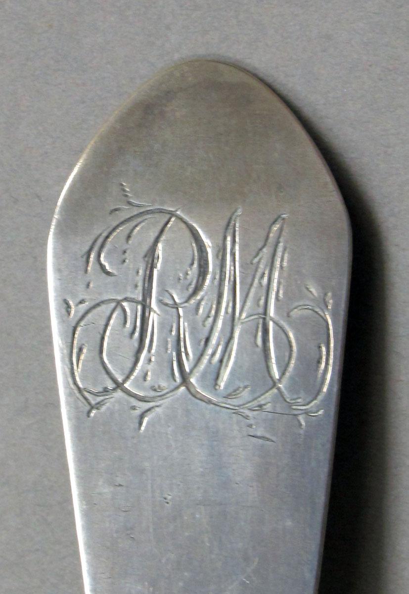 1962.0240.1297 Silver spoon engraving