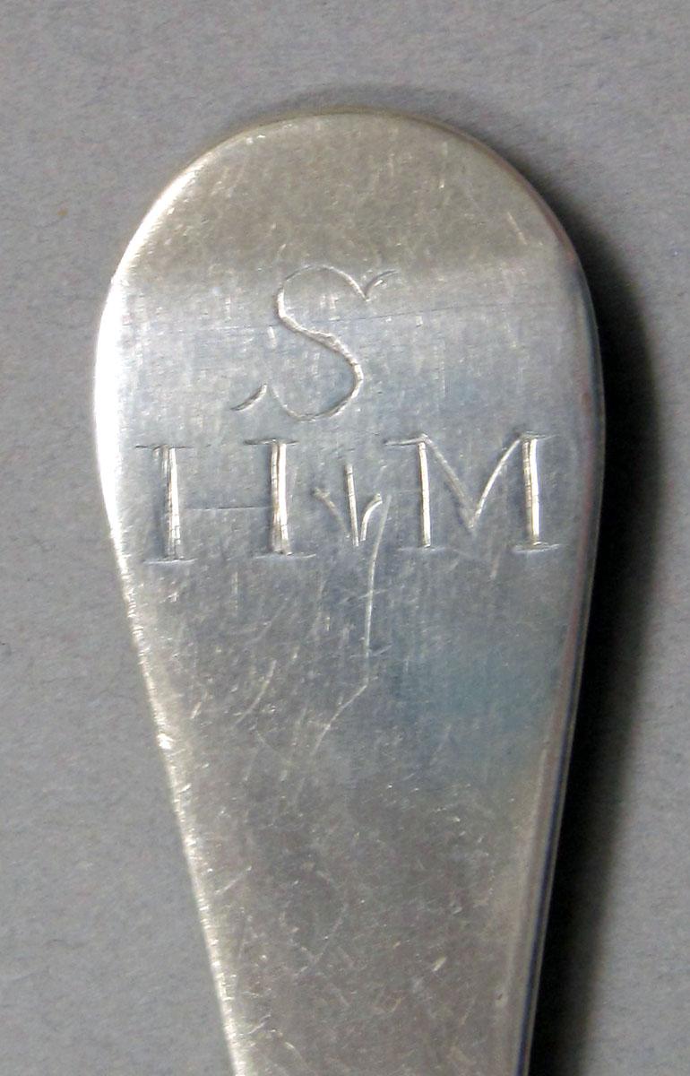 1962.0240.1299 Silver spoon engraving