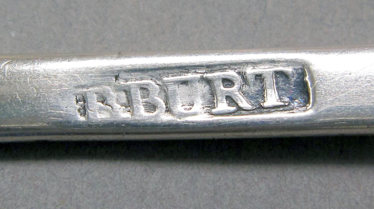 1962.0240.129 teaspoon mark