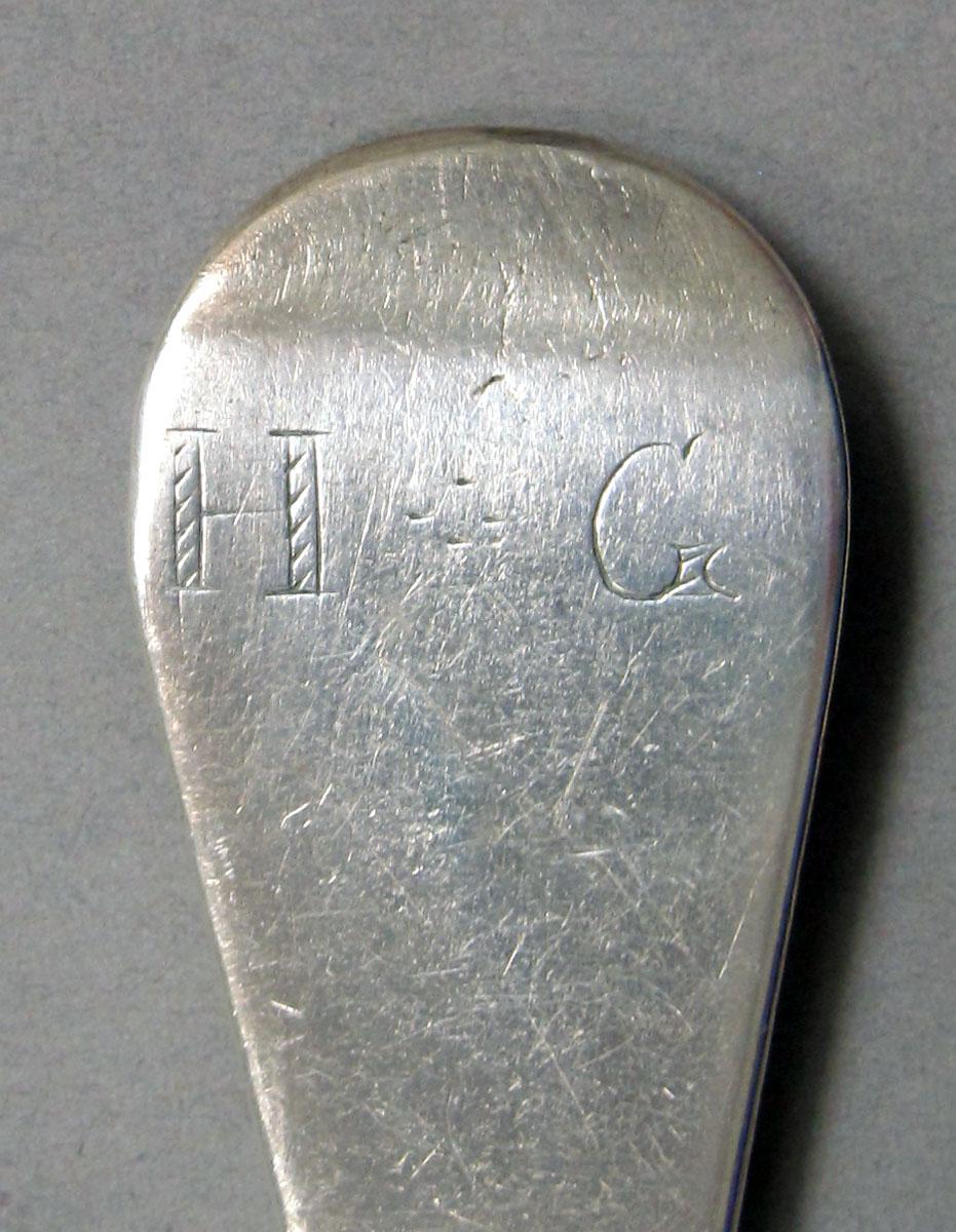 1962.0240.1301 Silver spoon engraving