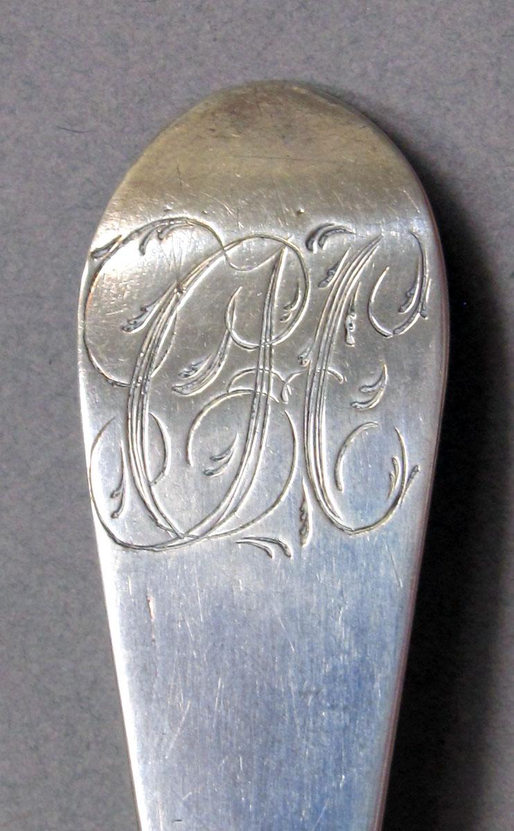 1962.0240.1309 Silver spoon engraving