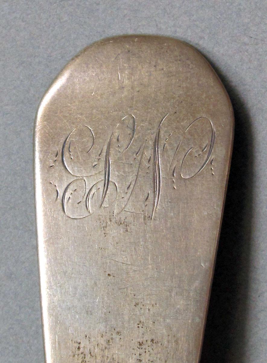 1962.0240.1312 Silver spoon engraving