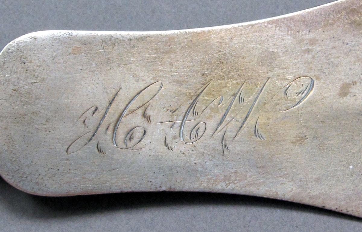 1962.0240.1317 Silver spoon engraving