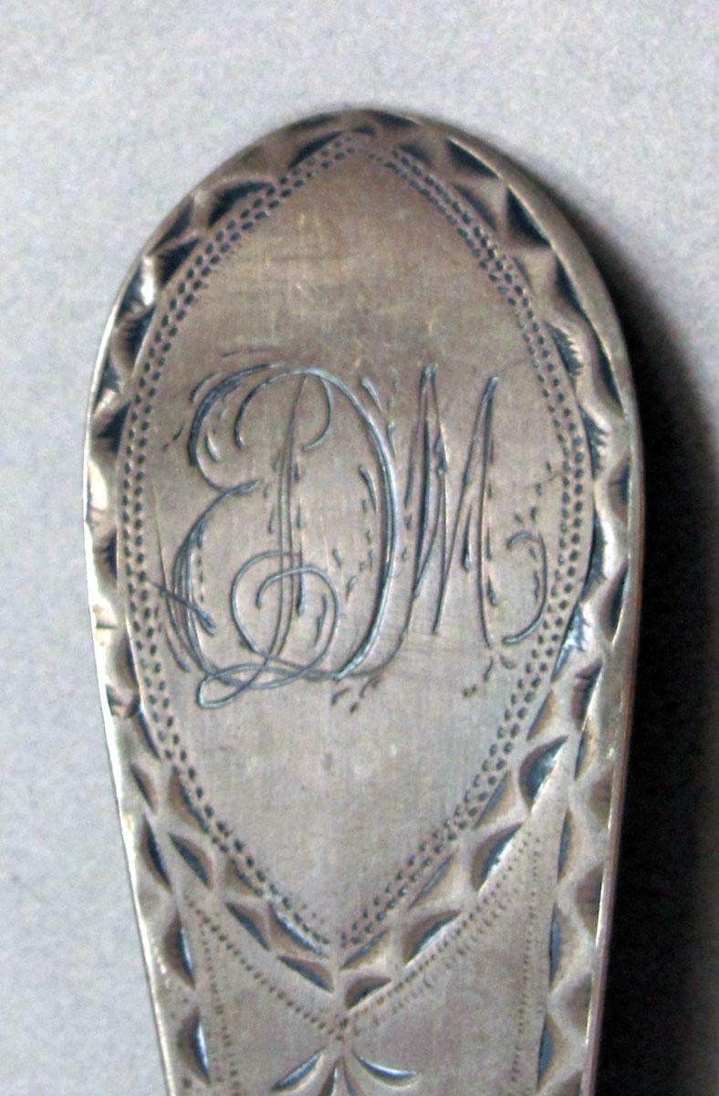 1962.0240.1321 Silver spoon engraving