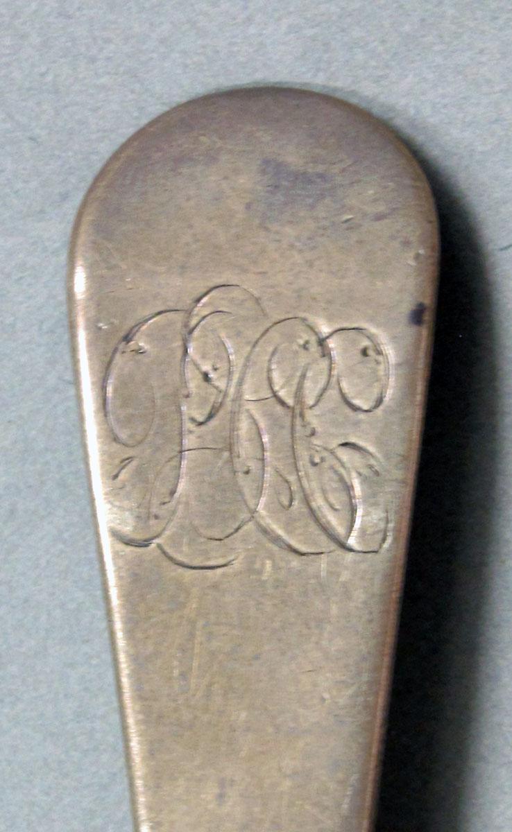 1962.0240.1323 Silver spoon engraving