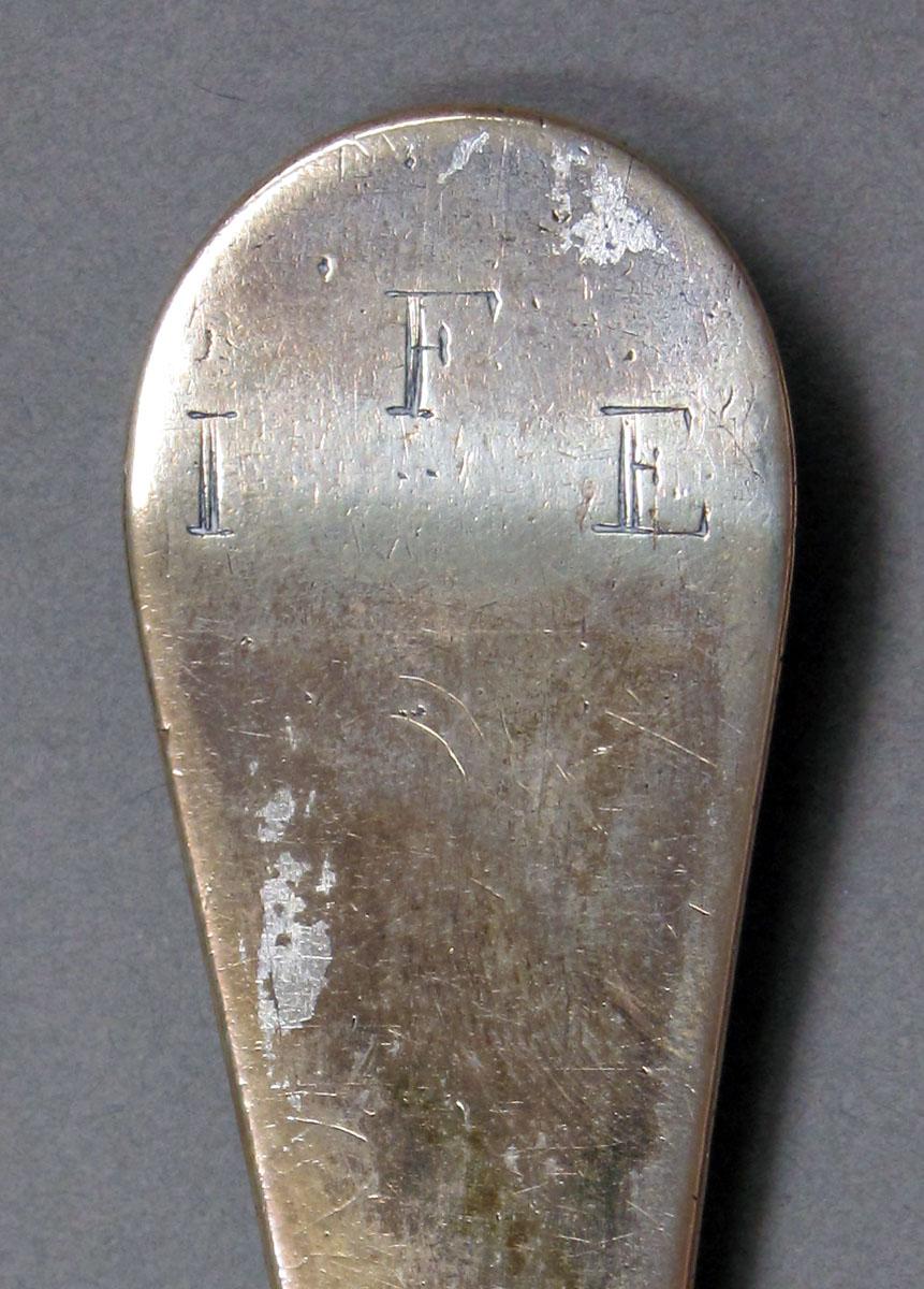 1962.0240.1324 Silver spoon engraving