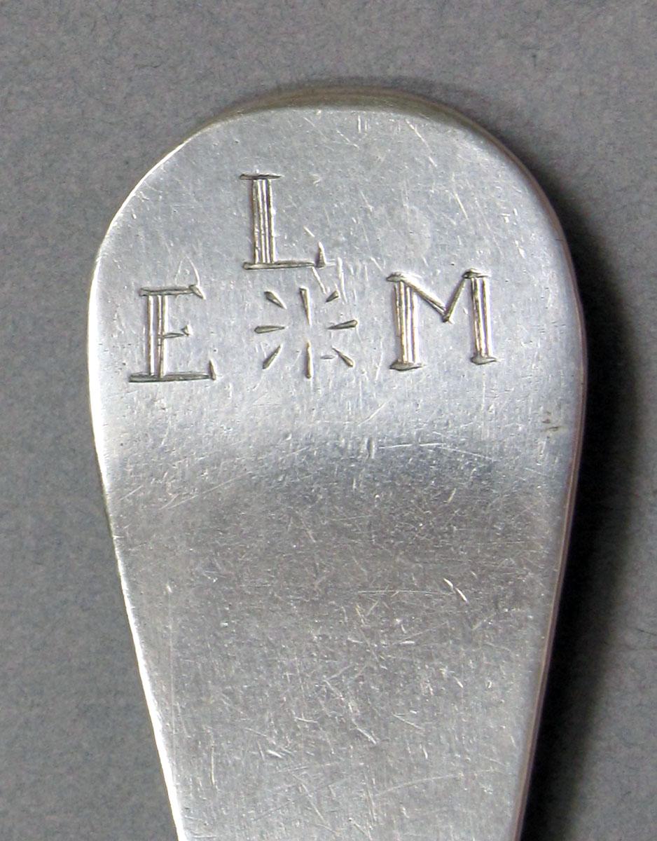 1962.0240.1327 Silver spoon engraving