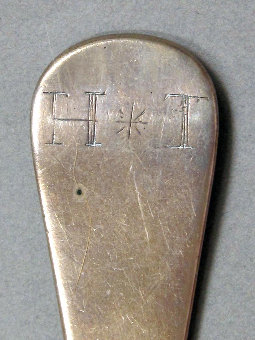 1962.0240.1331 Silver spoon engraving