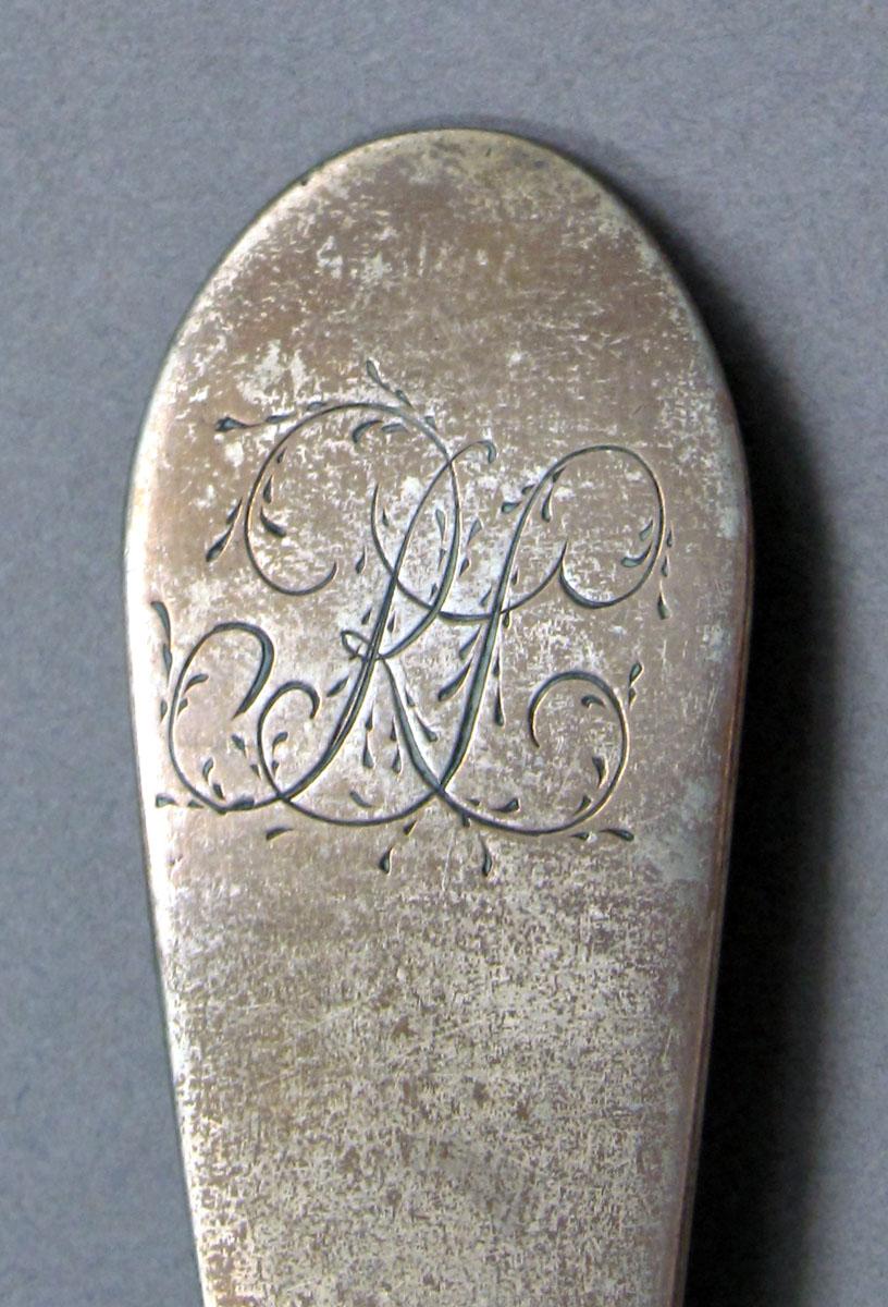 1962.0240.1332 Silver spoon engraving