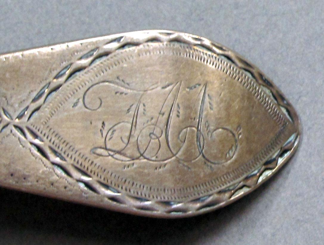 1962.0240.1337 Silver spoon engraving