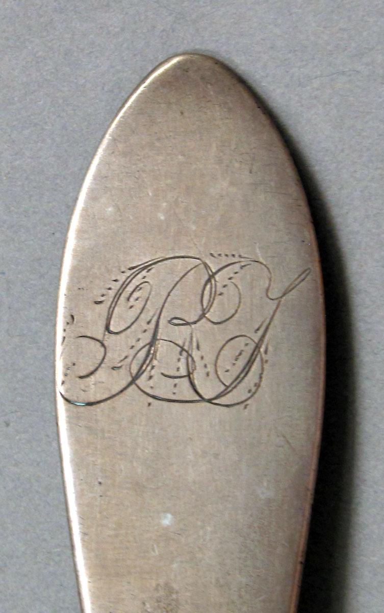 1962.0240.1341 Silver spoon engraving