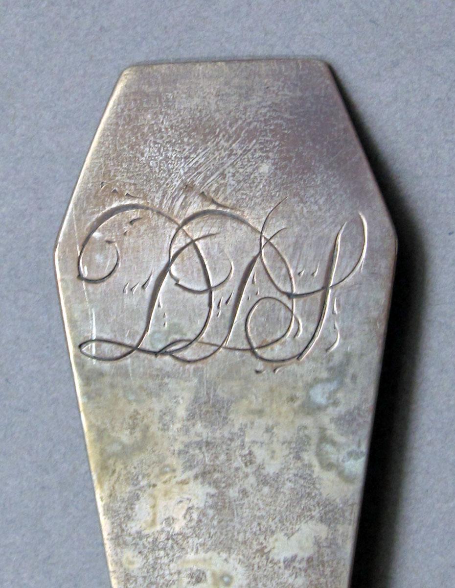 1962.0240.1343 Silver spoon engraving