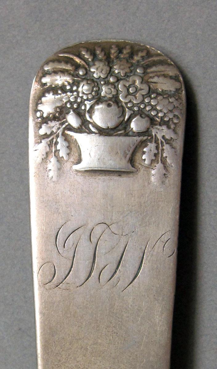 1962.0240.1346 Silver spoon engraving