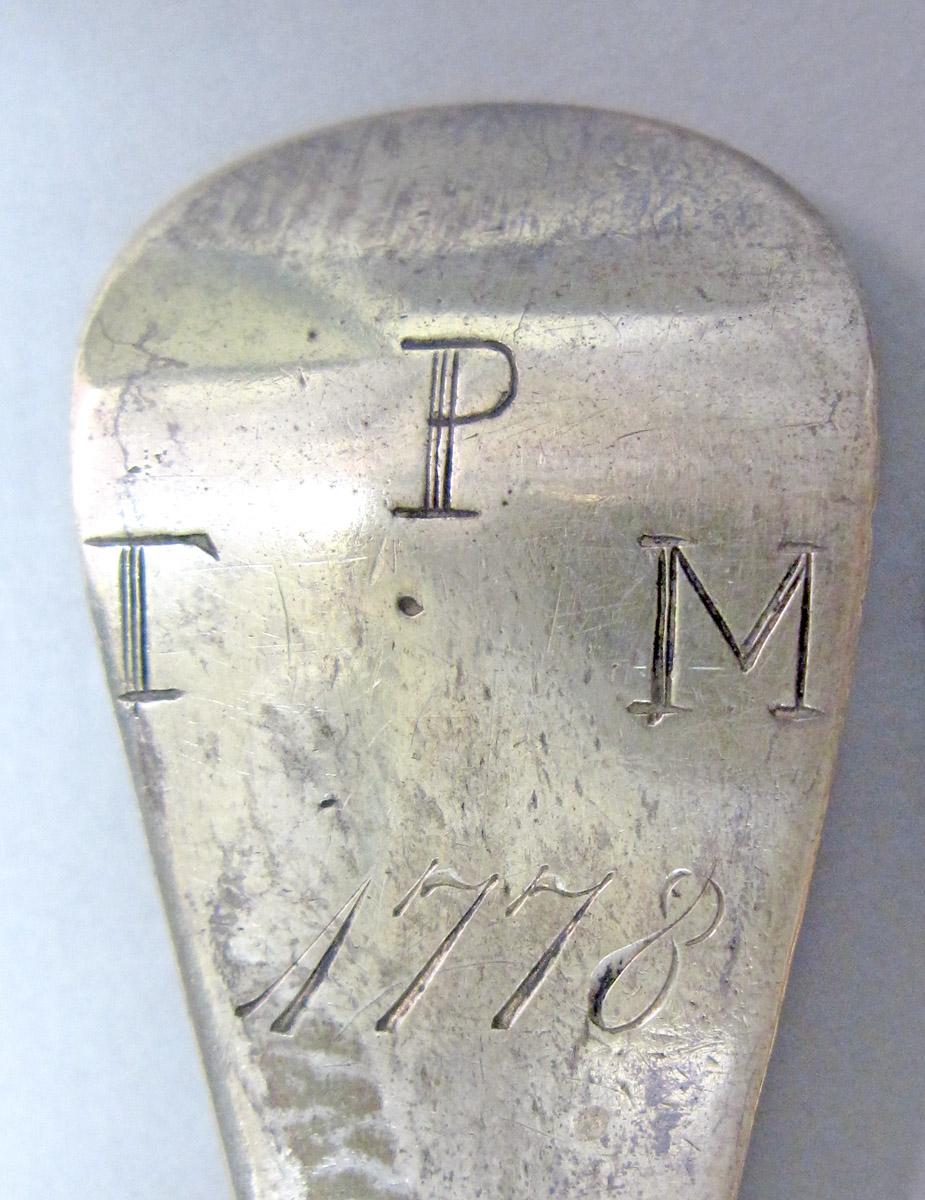 1962.0240.1348 Silver spoon engraving
