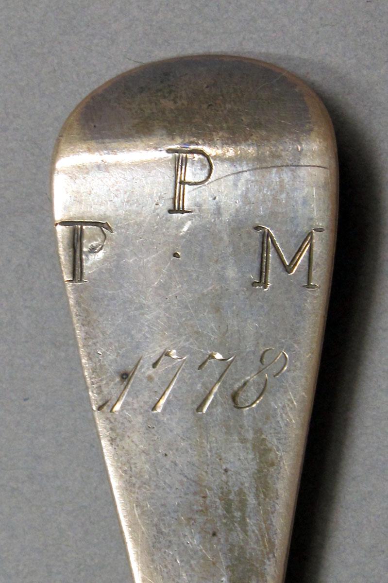 1962.0240.1350 Silver spoon engraving