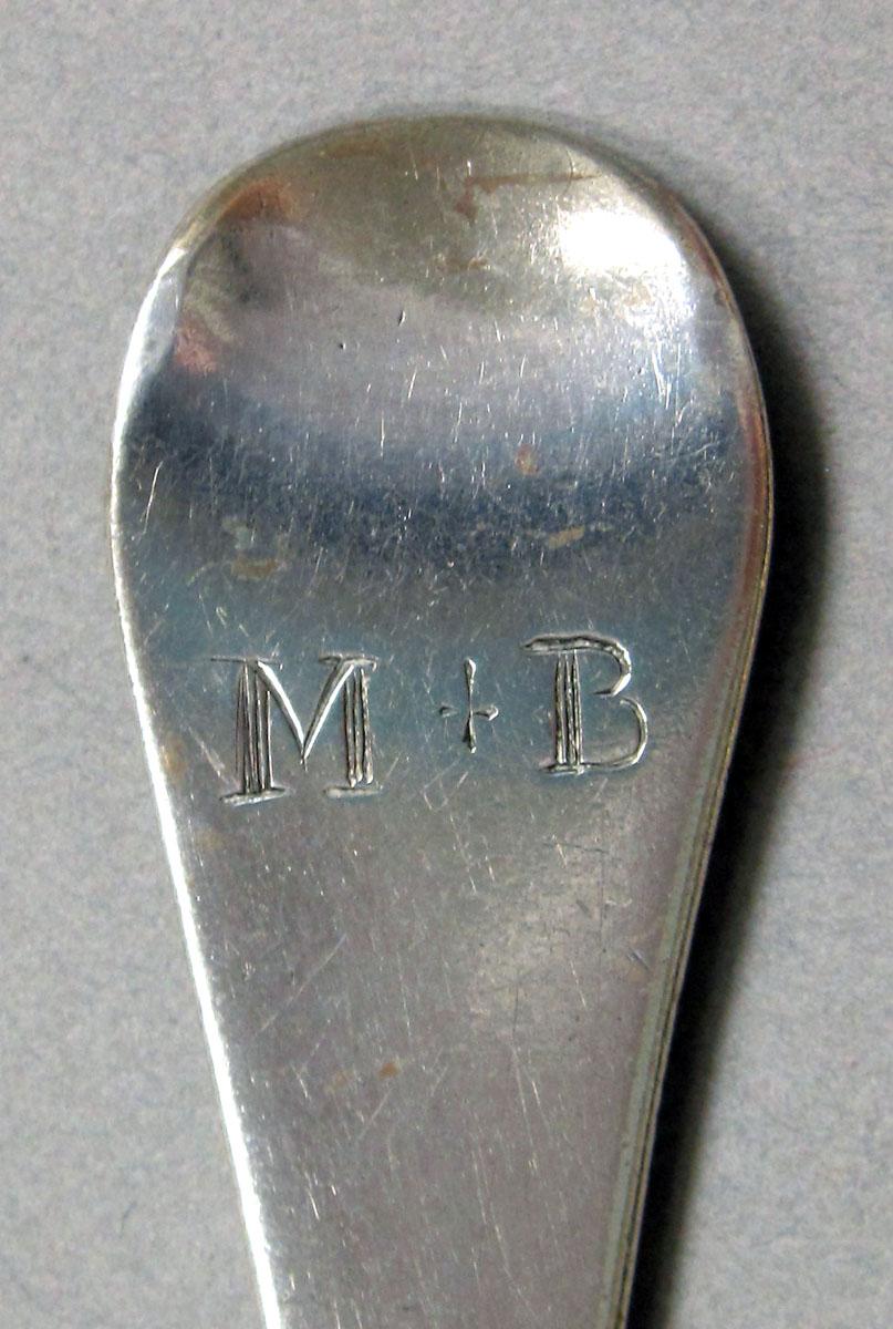 1962.0240.1352 Silver spoon engraving
