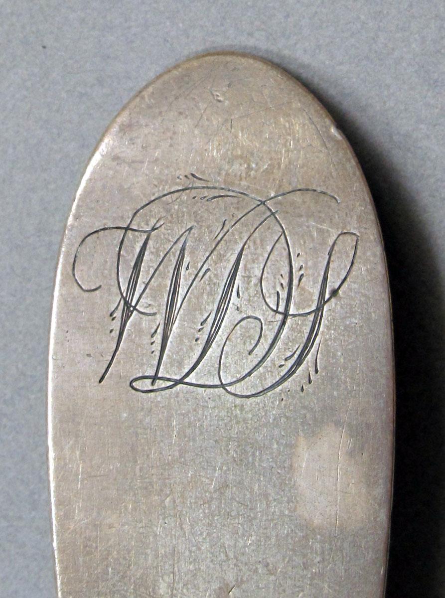 1962.0240.1353 Silver spoon engraving