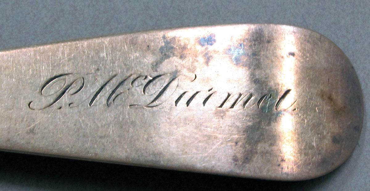 1962.0240.1354 Silver spoon engraving