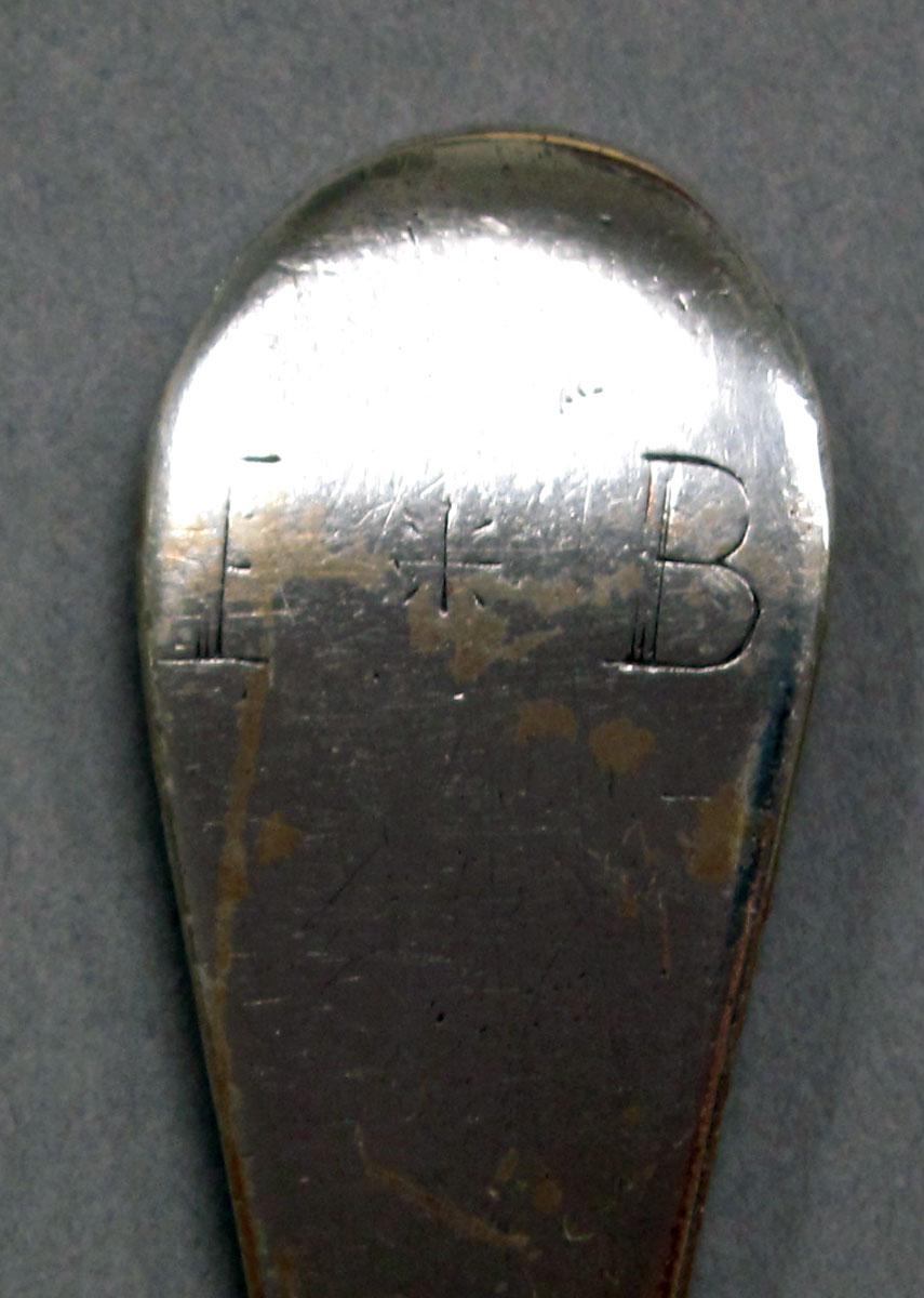 1962.0240.1355 Silver spoon engraving