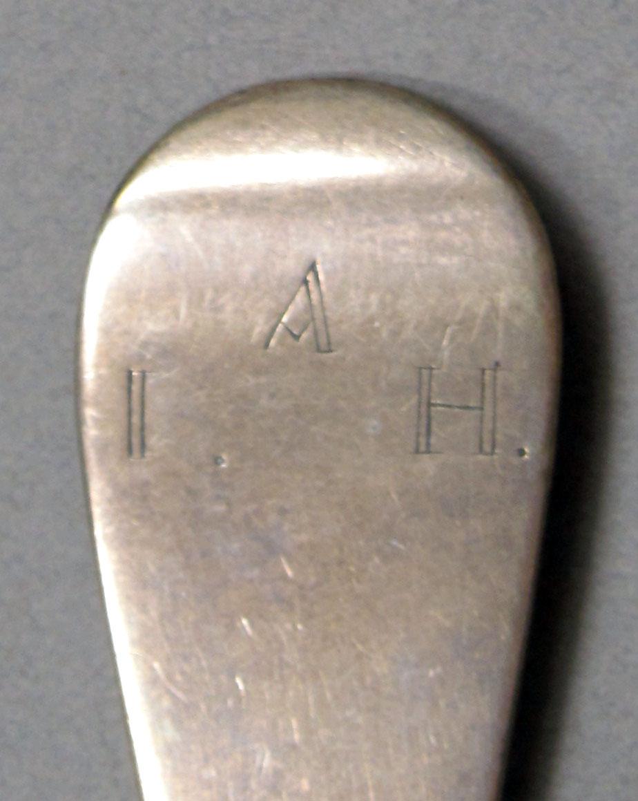 1962.0240.1358 Silver spoon engraving