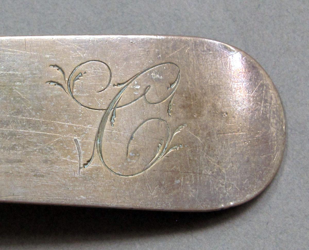 1962.0240.1362 Silver spoon engraving