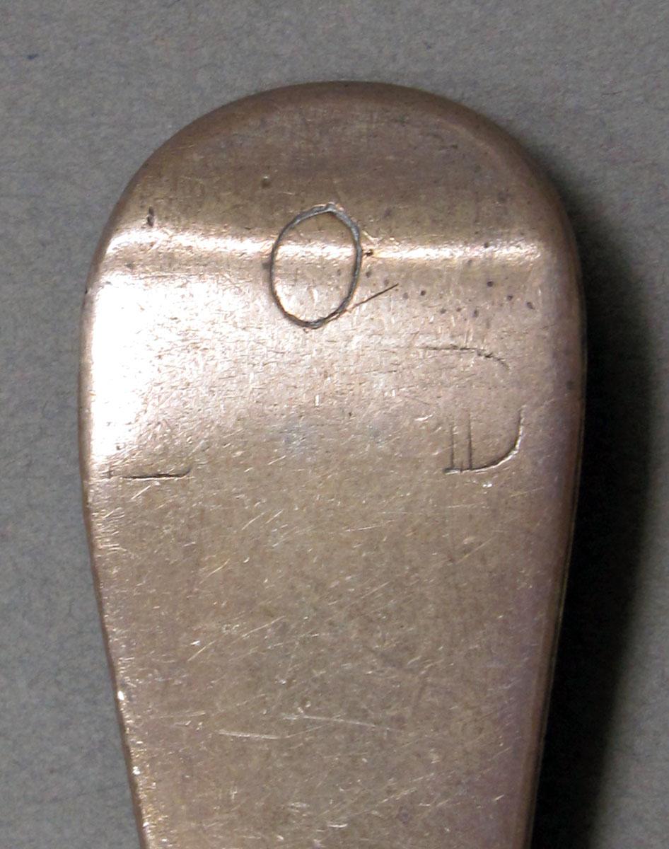 1962.0240.1364 Silver spoon engraving