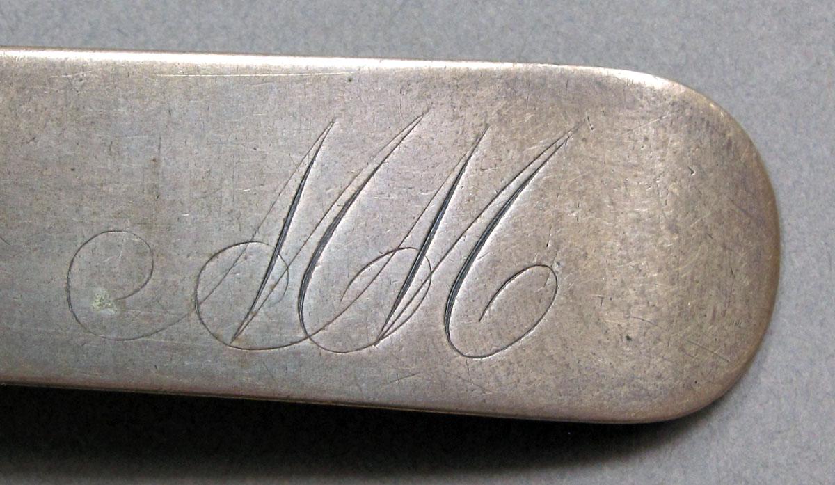 1962.0240.1365 Silver spoon engraving