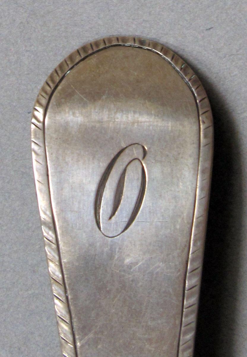 1962.0240.1368 Silver spoon engraving