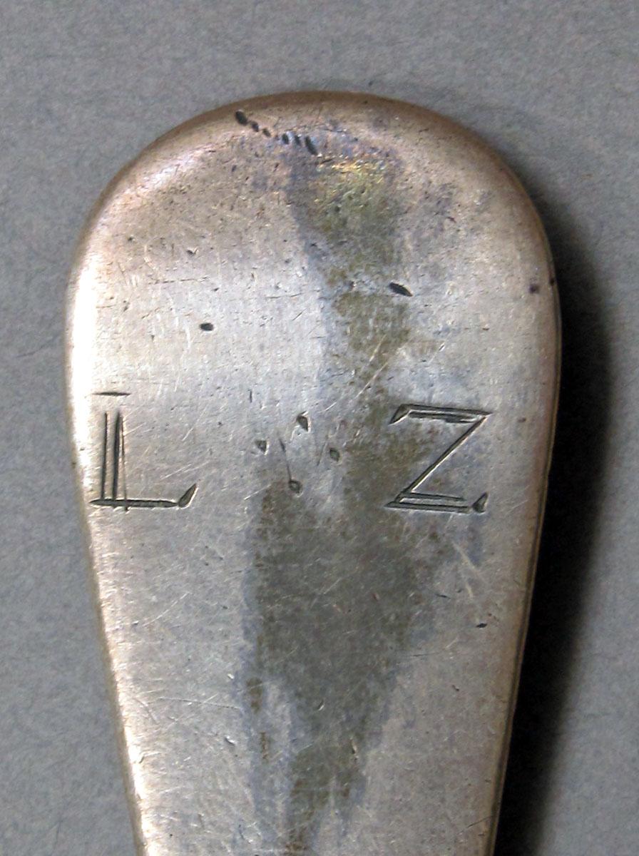 1962.0240.1371 Silver spoon engraving