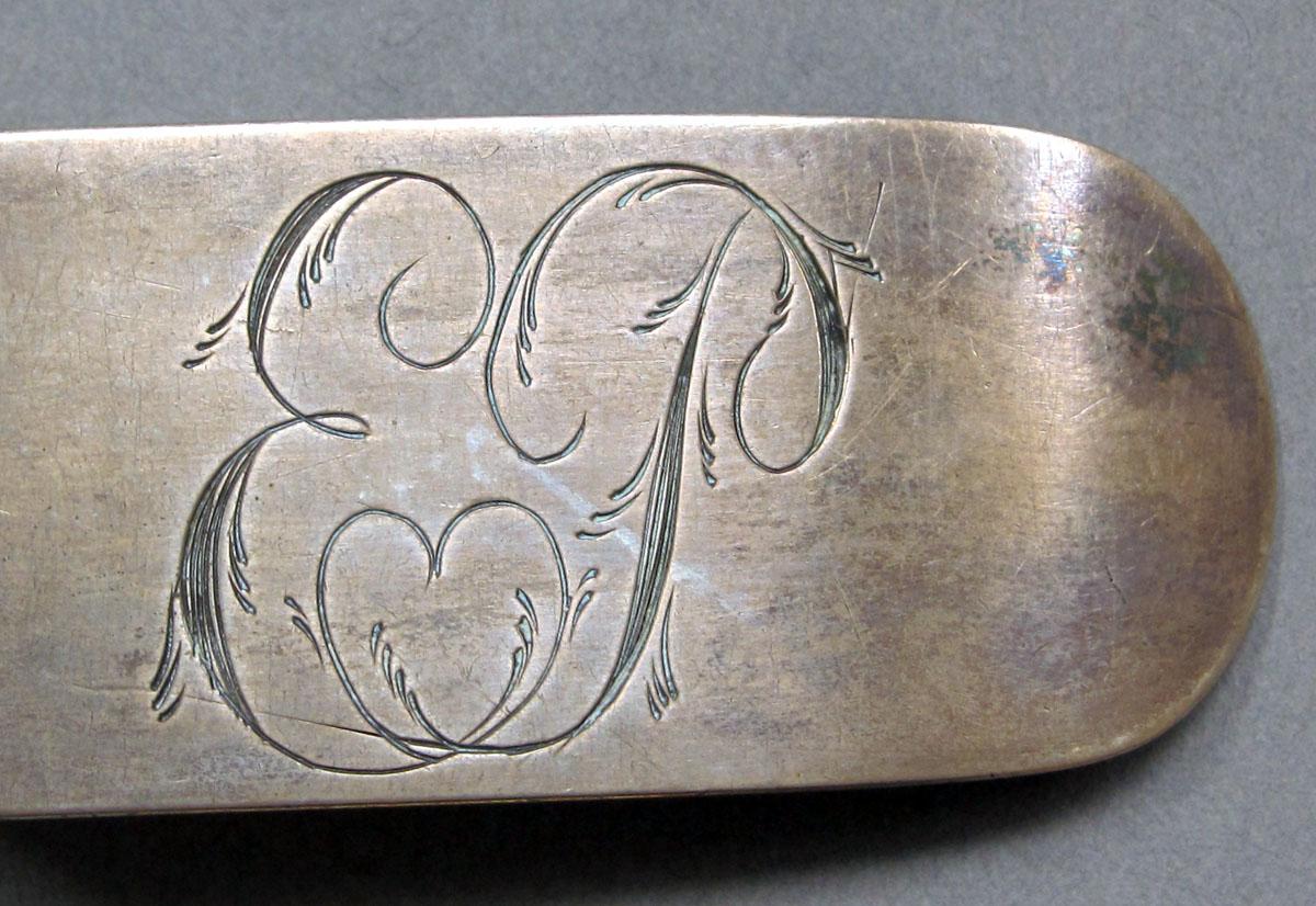 1962.0240.1372 Silver spoon engraving